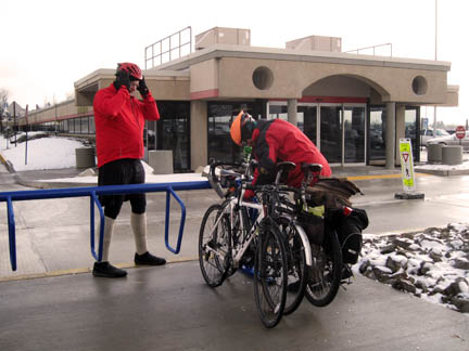 Bike parking in extended parking at the end of the airport hallway